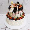 Свадебный торт с молодоженами в два яруса СТ416
