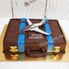 Торт "Мечты сбываются" в виде чемодана и с фигуркой самолета ТМ418