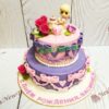 Торт "Торжественный" с фигуркой малыша, сладкими цветами и бантами ТГ226