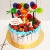 Торт "Тигренок в тропиках" с фигуркой, леденцами, ягодами и потеками ТГ240